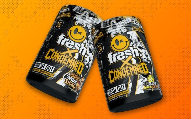 Two pre-workout supplement tubs from the Fresh™ x Condemned Labz™ collaboration, featuring bold black and yellow designs with cartoon graphics, showcasing the flavors Orange Cream Sicko and Locked Up Lemon Iced Tea.